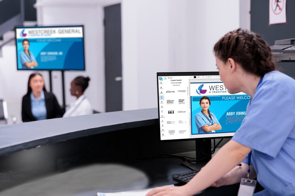 Hospital staff worker updating a LoopScreen display in real-time using the image editor.